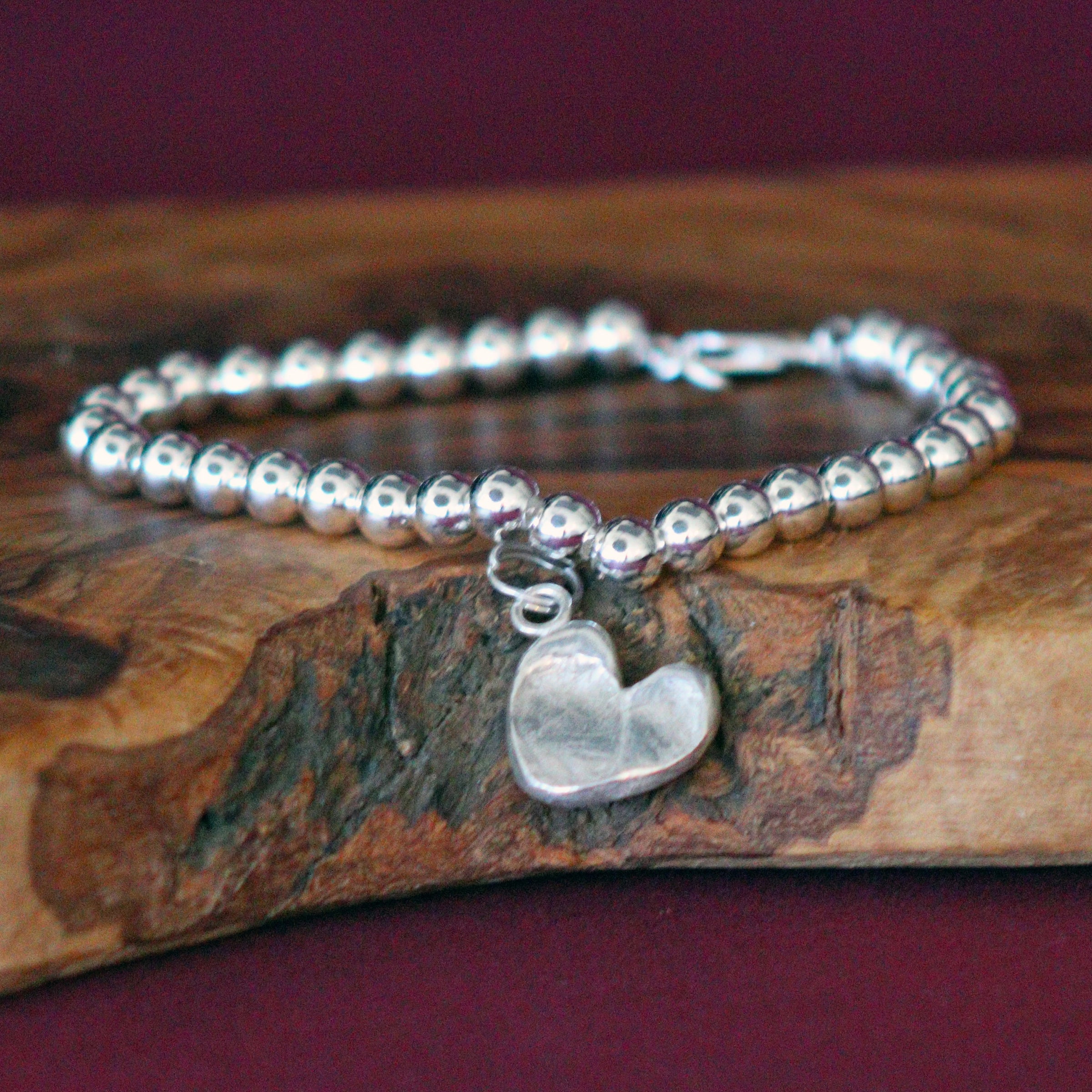 Silver bracelet with ball top